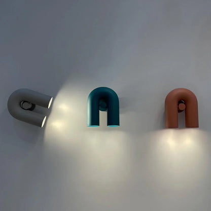 Nowoczesna lampa ścienna LED w kształcie łuku — designerski kinkiet, 4 kolory | Norivo Norivo