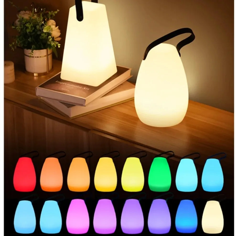 Przenośna lampka LED RGB z pilotem — ładowanie USB, 16 kolorów, 4 style | Norivo Norivo