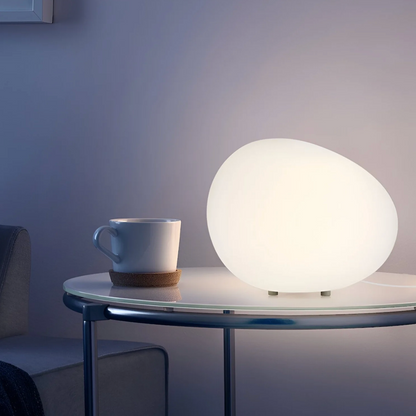 Lampka stołowa w kształcie kamienia — minimalistyczna forma organiczna, regulowana barwa | Norivo Norivo