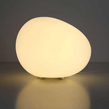 Lampka stołowa w kształcie kamienia — minimalistyczna forma organiczna, regulowana barwa | Norivo Norivo