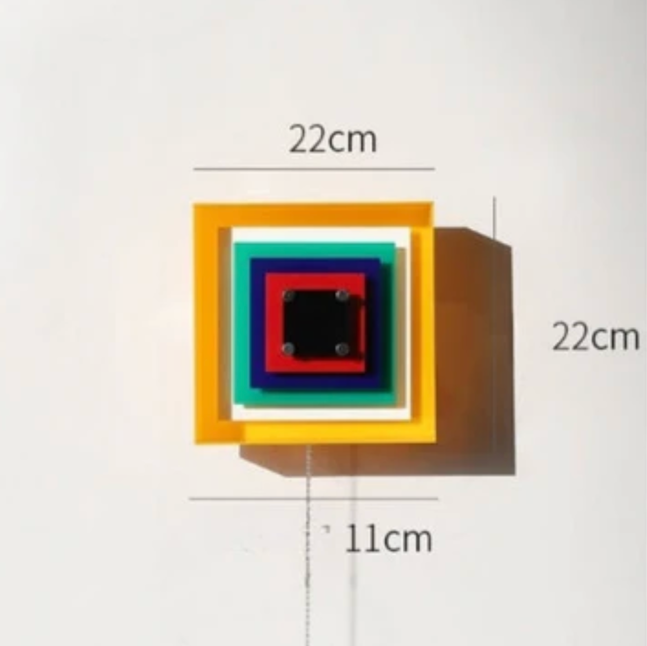 Designerski kinkiet ścienny Geometry — kolorowa lampa dekoracyjna z łańcuszkiem | Norivo Norivo