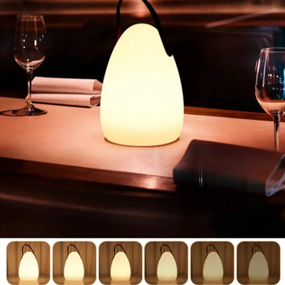 Przenośna lampka LED RGB z pilotem — ładowanie USB, 16 kolorów, 4 style | Norivo Norivo