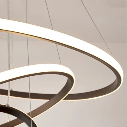 Designerska lampa wisząca LED — żyrandol z formą pierścieni 3D | Norivo Norivo