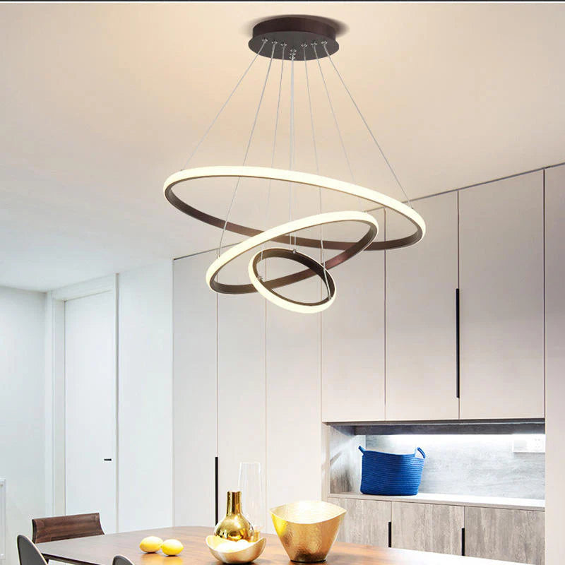 Designerska lampa wisząca LED — żyrandol z formą pierścieni 3D | Norivo Norivo