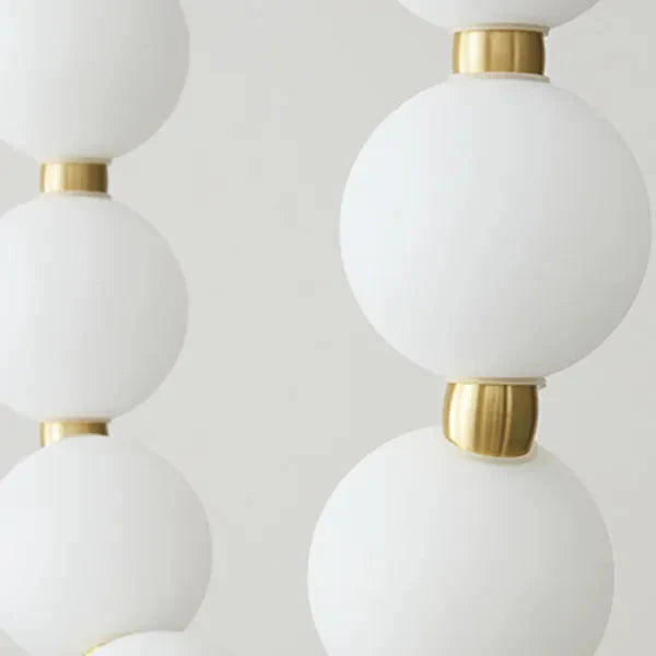 Lampa wisząca LED — efektowna forma naszyjnika z kulami świetlnymi | Norivo Norivo