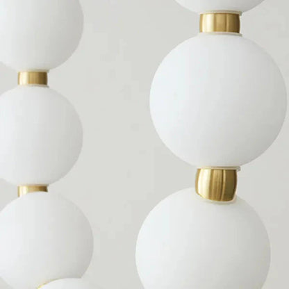 Lampa wisząca LED — efektowna forma naszyjnika z kulami świetlnymi | Norivo Norivo