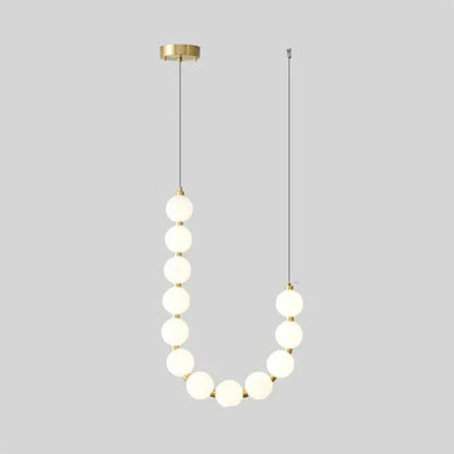 Lampa wisząca LED — efektowna forma naszyjnika z kulami świetlnymi | Norivo Norivo