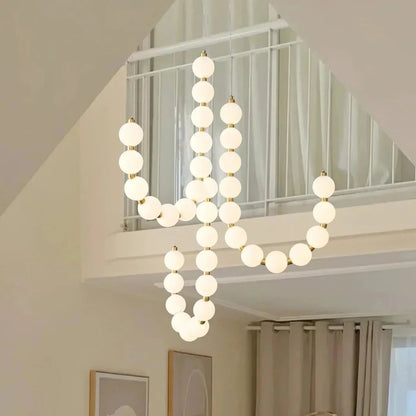 Lampa wisząca LED — efektowna forma naszyjnika z kulami świetlnymi | Norivo Norivo